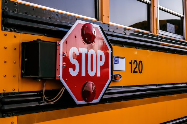 image of school bus stop sign flap
